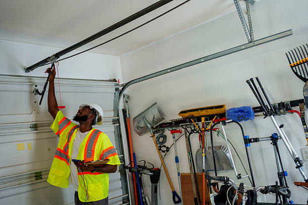 Professional Garage Door Panel Replacement technician working in Stark County County, ND